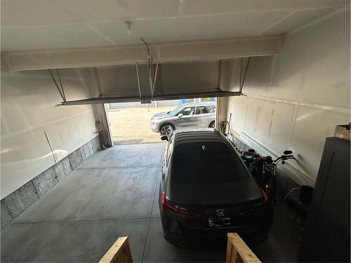 14 Yorkstone Walk Sw, Calgary, AB - Indoor Photo Showing Garage