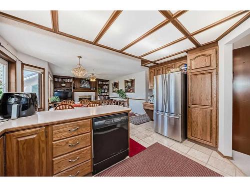 224 Edgebank Circle Nw, Calgary, AB - Indoor Photo Showing Dining Room With Fireplace