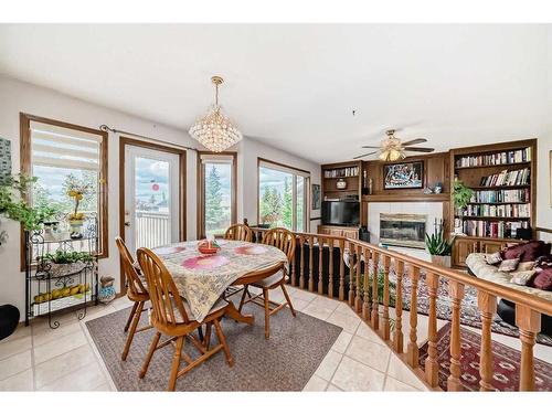 224 Edgebank Circle Nw, Calgary, AB - Indoor Photo Showing Living Room With Fireplace