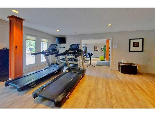 438-35 Richard Court Sw, Calgary, AB - Indoor Photo Showing Gym Room