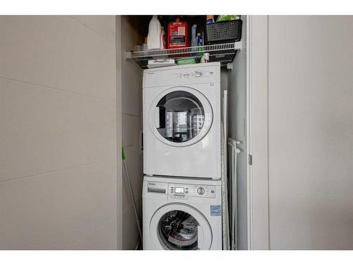 1206-930 6 Avenue Sw, Calgary, AB - Indoor Photo Showing Laundry Room