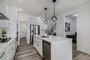 312 Calhoun Common Ne, Calgary, AB  - Indoor Photo Showing Kitchen With Double Sink With Upgraded Kitchen 