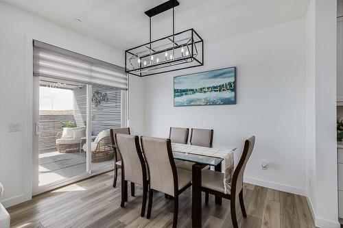 312 Calhoun Common Ne, Calgary, AB - Indoor Photo Showing Dining Room