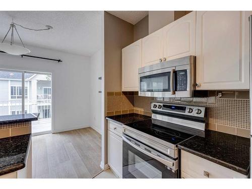 302-42 6A Street Ne, Calgary, AB - Indoor Photo Showing Kitchen With Stainless Steel Kitchen