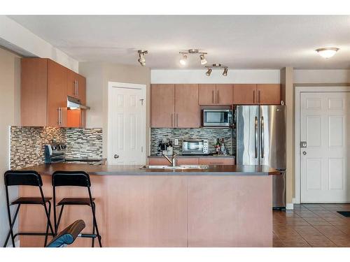 404-1724 26 Avenue Sw, Calgary, AB - Indoor Photo Showing Kitchen With Stainless Steel Kitchen