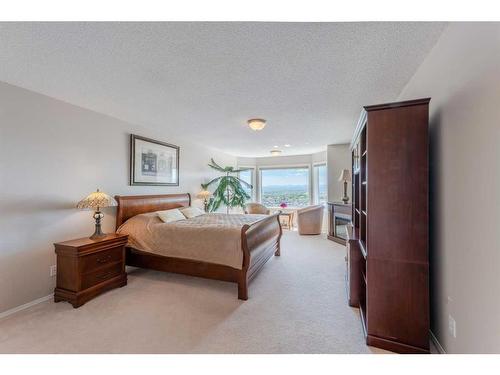 363 Rocky Ridge Drive Nw, Calgary, AB - Indoor Photo Showing Bedroom