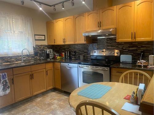 64 Dovista Court Se, Calgary, AB - Indoor Photo Showing Kitchen