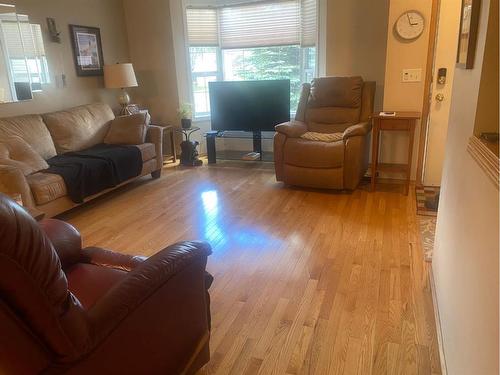 64 Dovista Court Se, Calgary, AB - Indoor Photo Showing Living Room