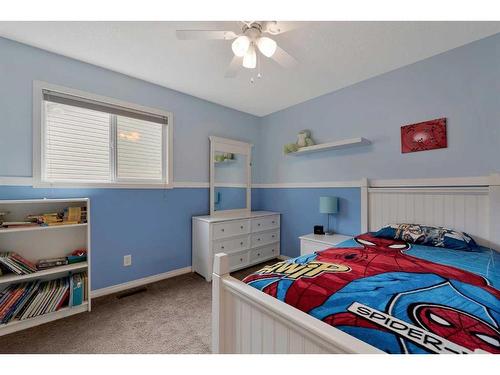 31 Copperstone Mews Se, Calgary, AB - Indoor Photo Showing Bedroom