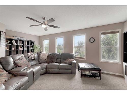 31 Copperstone Mews Se, Calgary, AB - Indoor Photo Showing Living Room