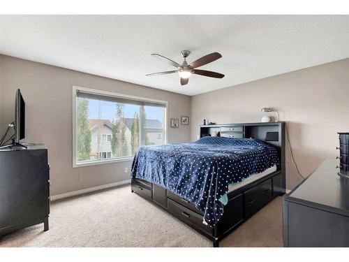 31 Copperstone Mews Se, Calgary, AB - Indoor Photo Showing Bedroom