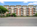 401-1410 2 Street Sw, Calgary, AB  - Outdoor With Balcony With Facade 