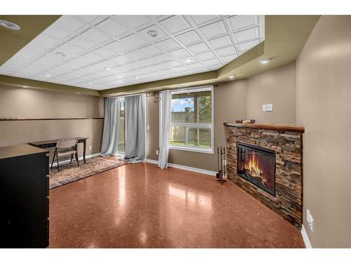 177 Royal Birch Mount Nw, Calgary, AB - Indoor With Fireplace