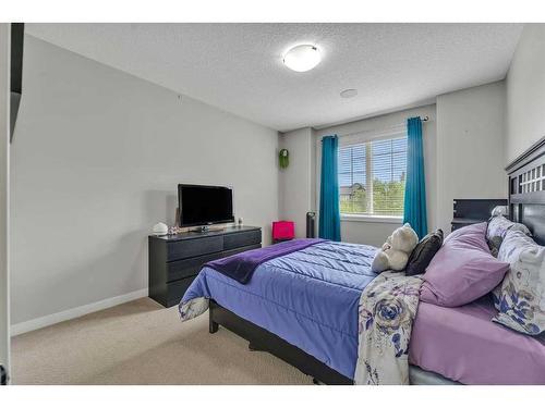 112 Auburn Bay Avenue Se, Calgary, AB - Indoor Photo Showing Bedroom