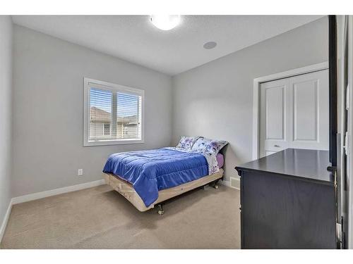 112 Auburn Bay Avenue Se, Calgary, AB - Indoor Photo Showing Bedroom