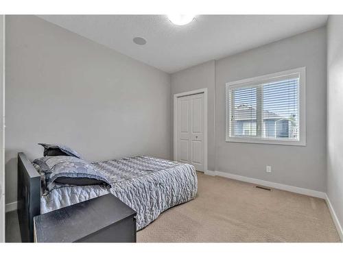 112 Auburn Bay Avenue Se, Calgary, AB - Indoor Photo Showing Bedroom