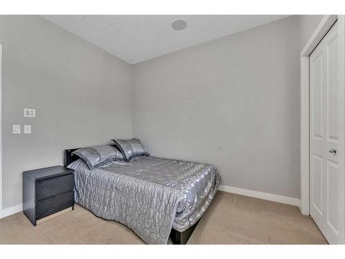 112 Auburn Bay Avenue Se, Calgary, AB - Indoor Photo Showing Bedroom