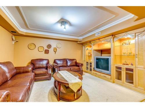 4 Cedargrove Road Sw, Calgary, AB - Indoor Photo Showing Living Room With Fireplace