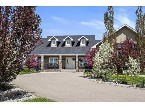 81008 404 Avenue East, Rural Foothills County, AB - Outdoor With Deck Patio Veranda With Facade