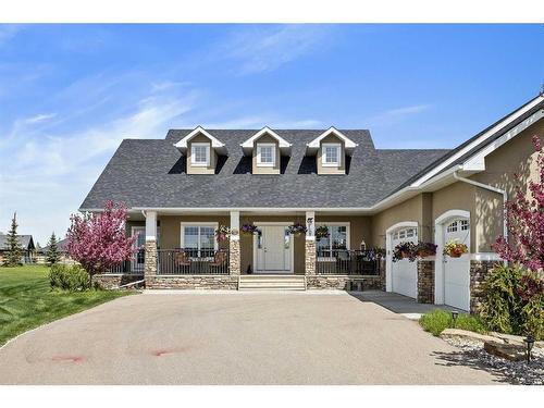 81008 404 Avenue East, Rural Foothills County, AB - Outdoor With Deck Patio Veranda With Facade