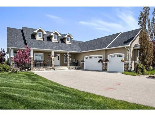 81008 404 Avenue East, Rural Foothills County, AB - Outdoor With Deck Patio Veranda With Facade