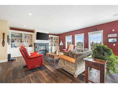 81008 404 Avenue East, Rural Foothills County, AB - Indoor Photo Showing Living Room With Fireplace