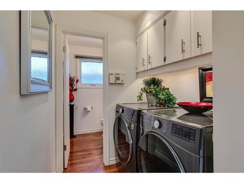 16 Woodfield Way Sw, Calgary, AB - Indoor Photo Showing Laundry Room