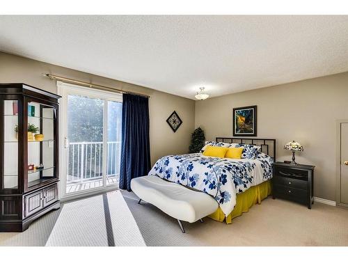 16 Woodfield Way Sw, Calgary, AB - Indoor Photo Showing Bedroom