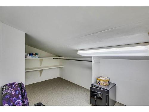 16 Woodfield Way Sw, Calgary, AB - Indoor With Storage