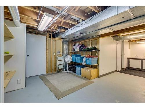 16 Woodfield Way Sw, Calgary, AB - Indoor Photo Showing Basement