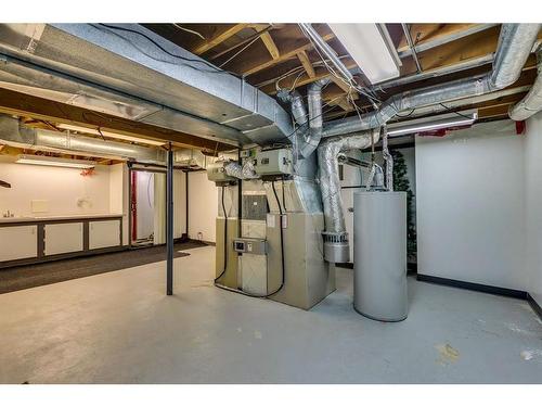 16 Woodfield Way Sw, Calgary, AB - Indoor Photo Showing Basement