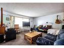 1607 41 Street Sw, Calgary, AB  - Indoor Photo Showing Living Room 