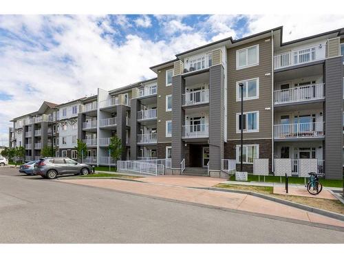 2304-6118 80 Avenue Ne, Calgary, AB - Outdoor With Balcony With Facade