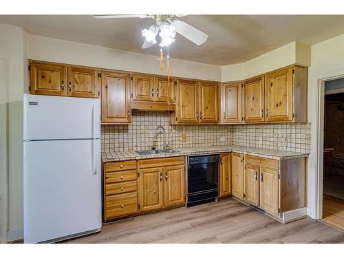 1619 9 Street Nw, Calgary, AB - Indoor Photo Showing Kitchen With Double Sink