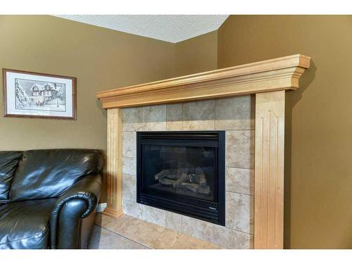 89 Coventry Hills Drive Ne, Calgary, AB - Indoor Photo Showing Living Room With Fireplace