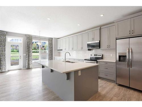 176 Hillcrest Drive Sw, Airdrie, AB - Indoor Photo Showing Kitchen With Stainless Steel Kitchen With Upgraded Kitchen