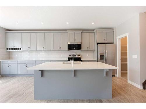 176 Hillcrest Drive Sw, Airdrie, AB - Indoor Photo Showing Kitchen With Stainless Steel Kitchen With Upgraded Kitchen