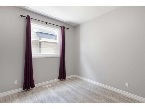 176 Hillcrest Drive Sw, Airdrie, AB - Indoor Photo Showing Other Room