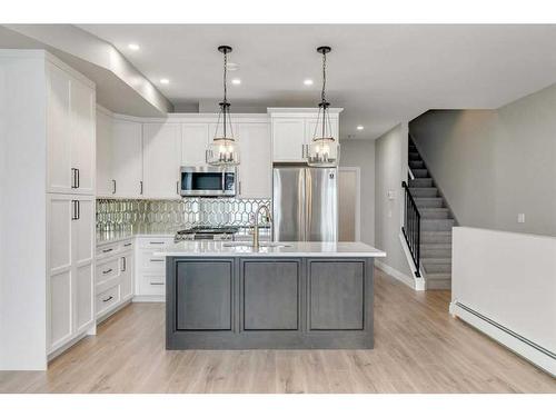 3-232 20 Avenue Ne, Calgary, AB - Indoor Photo Showing Kitchen With Upgraded Kitchen