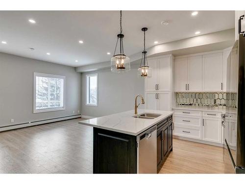 3-232 20 Avenue Ne, Calgary, AB - Indoor Photo Showing Kitchen With Double Sink With Upgraded Kitchen