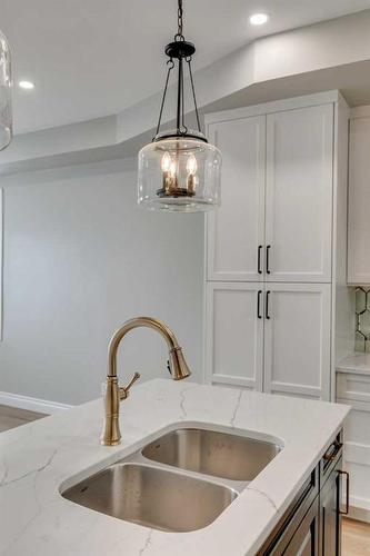 3-232 20 Avenue Ne, Calgary, AB - Indoor Photo Showing Kitchen With Double Sink