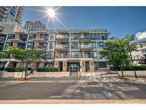 412-51 Waterfront Mews Sw, Calgary, AB - Outdoor With Balcony With Facade