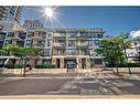 412-51 Waterfront Mews Sw, Calgary, AB  - Outdoor With Balcony With Facade 