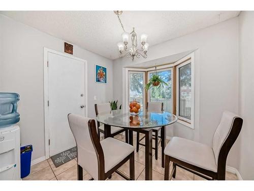 55 Millrise Lane Sw, Calgary, AB - Indoor Photo Showing Dining Room