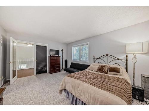 55 Millrise Lane Sw, Calgary, AB - Indoor Photo Showing Bedroom
