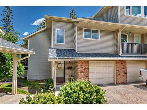 55 Millrise Lane Sw, Calgary, AB - Outdoor With Facade