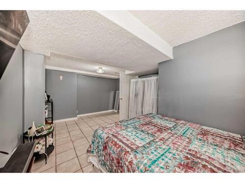 55 Millrise Lane Sw, Calgary, AB - Indoor Photo Showing Bedroom