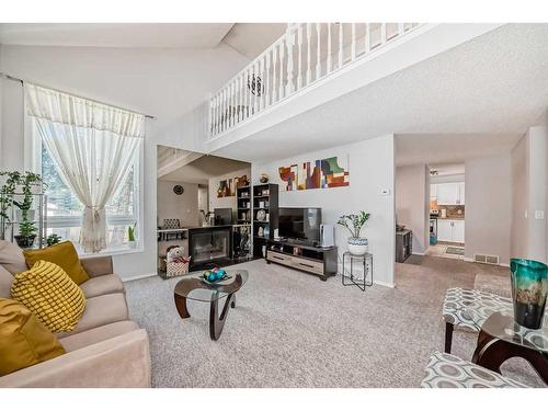 55 Millrise Lane Sw, Calgary, AB - Indoor Photo Showing Living Room