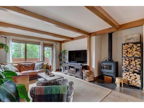 922A 9Th Streert Street, Canmore, AB - Indoor Photo Showing Living Room With Fireplace