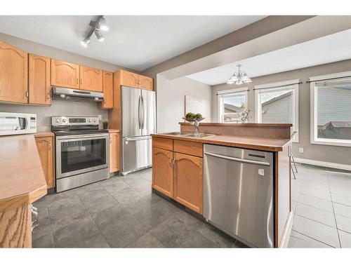 15909 Everstone Road Sw, Calgary, AB - Indoor Photo Showing Kitchen With Double Sink